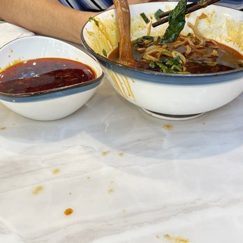 Noodle St - Spicy Beef Noodle Soup (the little bowl is filled with oil!) - Noodles Near Me - Pasadena, California Noodle St - Spicy Beef Noodle Soup (the little bowl is filled with oil!) - Noodles Near Me - Pasadena, California
