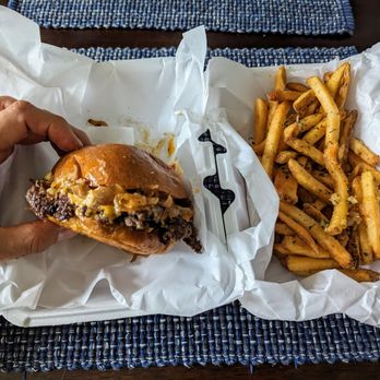 Drips Cheesecake - Double Dribble smash burger (left), garlic fries (right) - Desserts Near Me - Long Beach, California Drips Cheesecake - Double Dribble smash burger (left), garlic fries (right) - Desserts Near Me - Long Beach, California