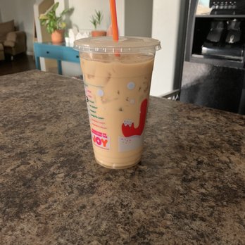 Dunkin' - a drink in a plastic cup on a counter - Coffee & Tea Near Me - Maricopa, Arizona Dunkin' - a drink in a plastic cup on a counter - Coffee & Tea Near Me - Maricopa, Arizona