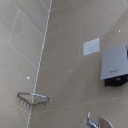 Comfort Hotel - Shower within guest bathroom in a room at Comfort Hotel Luton, photographed in October 2016
