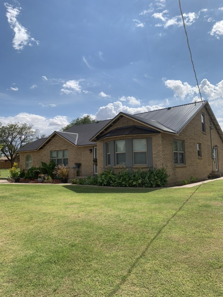 Slide of Top Roofing & Construction