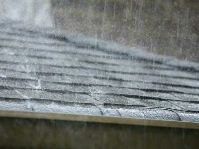 Slide of Top Gunz Roofing