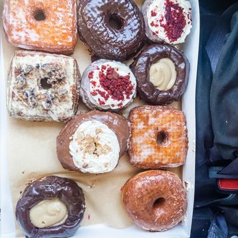 DoughBird - Square sated caramel cronut Chocolate  Red velvet  Boston cremes  Nutella cremes  Maple glazed  And lemon blueberry cronut square - Chicken Shop Near Me - Moab, Utah