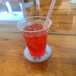 a drink in a plastic cup