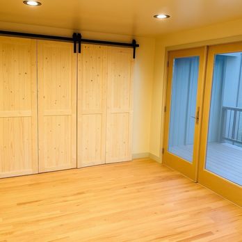 RemodelMe - Smaller 6ft+ closet with custom bi fold barn door. Hardwood flooring. New patio French door. New recessed lighting. - Roofing Near Me - Los Angeles, California RemodelMe - Smaller 6ft+ closet with custom bi fold barn door. Hardwood flooring. New patio French door. New recessed lighting. - Roofing Near Me - Los Angeles, California