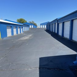 A 1 Mini Storage - Paved drive-up access with roll-up doors.