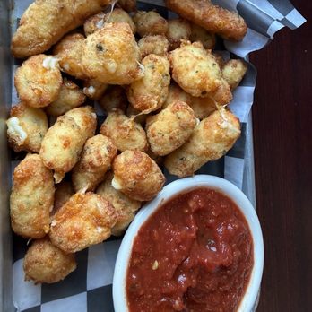 Two Sisters Cafe - Garlic cheese curds with homemade marinara - American Near Me - Babb, Montana Two Sisters Cafe - Garlic cheese curds with homemade marinara - American Near Me - Babb, Montana