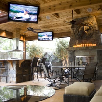 Wood Crafters - Rustic designed outdoor living area with fireplace, outdoor kitchen, tongue and groove cedar ceiling and more in Houston. - General Contractors Near Me - Houston, Texas Wood Crafters - Rustic designed outdoor living area with fireplace, outdoor kitchen, tongue and groove cedar ceiling and more in Houston. - General Contractors Near Me - Houston, Texas