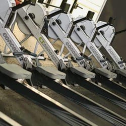 AK CrossFit - Array of rowers waiting to kills us