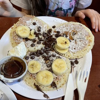 Eggs 'n Things - Waikiki Beach Eggspress - Kids Chocolate chip pancakes and added a side of bananas - Breakfast & Brunch Near Me - Honolulu, Hawaii Eggs 'n Things - Waikiki Beach Eggspress - Kids Chocolate chip pancakes and added a side of bananas - Breakfast & Brunch Near Me - Honolulu, Hawaii