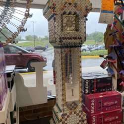 Learning Express Toys Of Geneva - Knex grandfather clock sculpture in front of the store