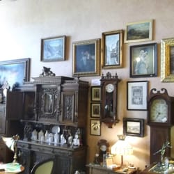 Arrowsmith Gallery - This cabinet is a must see. It is hand carved.