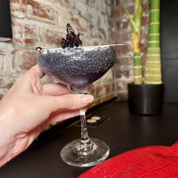 Sesamo - The Pompeii Sunset Margarita with tequila bianco, yuzu, lime, hibiscus syrup, blood orange cello, aquafaba, and lava salt - Italian Near Me - New York, New York Sesamo - The Pompeii Sunset Margarita with tequila bianco, yuzu, lime, hibiscus syrup, blood orange cello, aquafaba, and lava salt - Italian Near Me - New York, New York