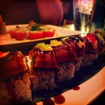 Mikado - crocodile roll-spicy tuna &cucumber inside, grilled eel, special&spicy sauce &tobiko on top), cherry blossom roll in background. - Chinese Near Me - Beverly, Massachusetts Mikado - crocodile roll-spicy tuna &cucumber inside, grilled eel, special&spicy sauce &tobiko on top), cherry blossom roll in background. - Chinese Near Me - Beverly, Massachusetts