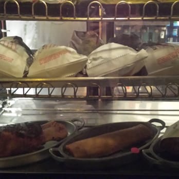 Edelweiss Snacks - Jumbo turkey leg ($9.79), glazed pork shank  ($9.79) & chimichanga ($6.29) - Food Stands Near Me - Anaheim, California