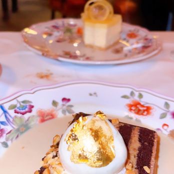 Carbone - Chocolate Hazelnut cake and lemon cheesecake - New American Near Me - Miami Beach, Florida Carbone - Chocolate Hazelnut cake and lemon cheesecake - New American Near Me - Miami Beach, Florida