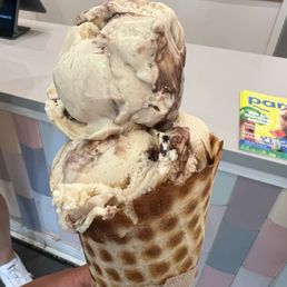 Double scoop of peanut butter fudge on a waffle cone Double scoop of peanut butter fudge on a waffle cone