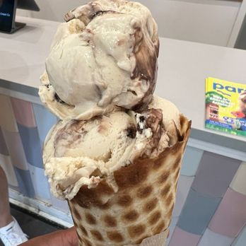 Blue Cow Ice Cream - Double scoop of peanut butter fudge on a waffle cone - Ice Cream & Frozen Yogurt Near Me - Fredericksburg, Virginia Blue Cow Ice Cream - Double scoop of peanut butter fudge on a waffle cone - Ice Cream & Frozen Yogurt Near Me - Fredericksburg, Virginia