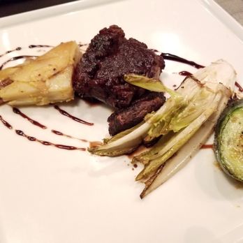 Vento - Duck Emince: Hibiscus flower and cardamom sauce, Grana padano layered potato triangle, grilled veggies. - Mediterranean Near Me - Playa del Carmen, ROO