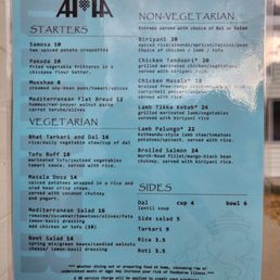 Menu - Menu from Ama Kitchen in Madison, WI, listing vegetarian and non-vegetarian options including starters, salads, and sides.
