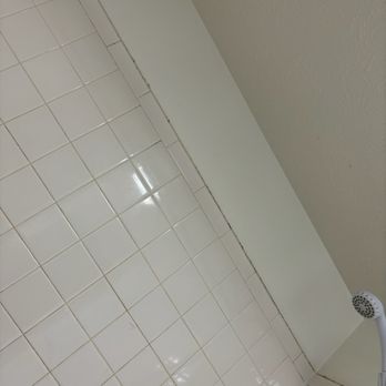 EZ Day Cleaning - Mildew not cleaned up from upper tile edge. - Home Cleaning Near Me - Cincinnati, Ohio