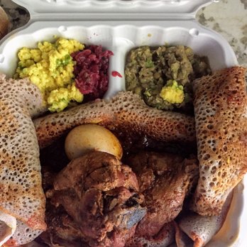 Ethiopis - Doro wat (chiken stew). Fall off the bone chicken and spicy in a good way - Ethiopian Near Me - Rockville, Maryland Ethiopis - Doro wat (chiken stew). Fall off the bone chicken and spicy in a good way - Ethiopian Near Me - Rockville, Maryland
