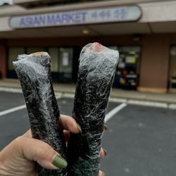 Asian Market - Kimbap duo!  Perfect snack $2 each (8/1/23). They are located in front by the cash register.