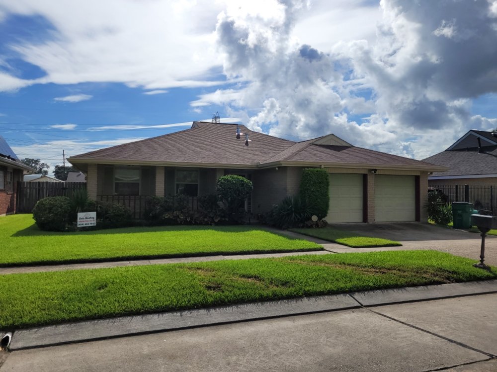 Slide of Del's & Son Roofing