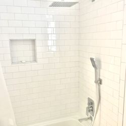 All New: tub, tile wall, tile floor, hardware