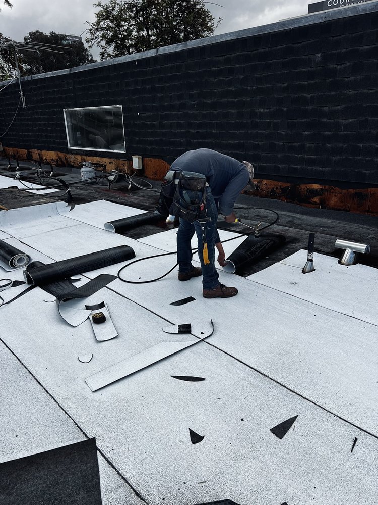 Slide of Kayhan's Roofing