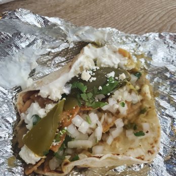 Granny's Tacos - Chilaquil taco with green sauce. So much umami. Eyes rolling to the back of the head delicious! - Food Trucks Near Me - Austin, Texas Granny's Tacos - Chilaquil taco with green sauce. So much umami. Eyes rolling to the back of the head delicious! - Food Trucks Near Me - Austin, Texas