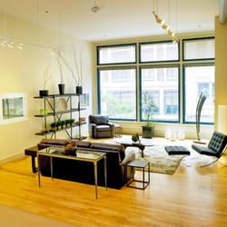 Westminster Lofts - Extremely spacious living area with floor-to-ceiling windows in this open floor plan loft in the Peerless building.