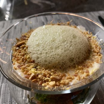 Partage - Coconut soup with chopped nuts. - French Near Me - Las Vegas, Nevada