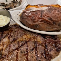 Lucky's Steak House - 16oz Dinner Ribeye Steak with sweet potato side