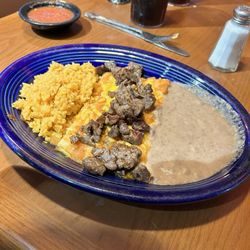 El Patio Escondido Mexican Restaurant - Cheese Enchiladas with fajita meat.