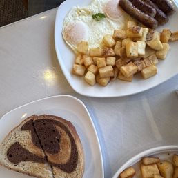 The Classic Breakfast with Rye toast and sausage The Classic Breakfast with Rye toast and sausage