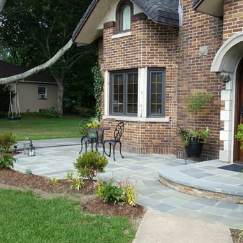 Kelly Brothers Landscaping - the front of a brick house - Landscaping Near Me - Coram, New York Kelly Brothers Landscaping - the front of a brick house - Landscaping Near Me - Coram, New York
