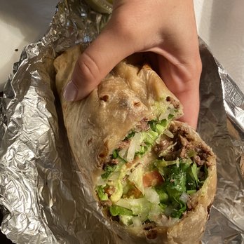Taqueria D.F. - Steak burrito fully dressed (lettuce, cheese, tomato, cilantro, avocado) - Mexican Near Me - Houma, Louisiana