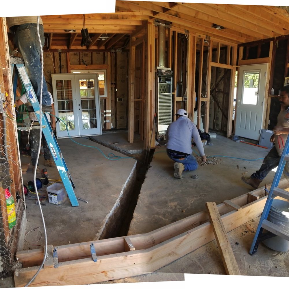 RAW Construction & Design - two men working on a house - General Contractors Near Me RAW Construction & Design - two men working on a house - General Contractors Near Me