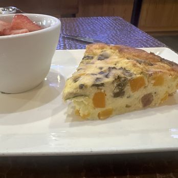 The Bodacious Olive - Chef special frittata with bowl of fresh beautiful fruit - Specialty Food Near Me - Pensacola, Florida The Bodacious Olive - Chef special frittata with bowl of fresh beautiful fruit - Specialty Food Near Me - Pensacola, Florida