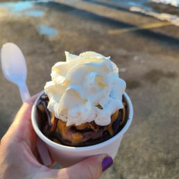 Chocolate peanut butter cup with whipped cream, peanut butter sauce and hot fudge!