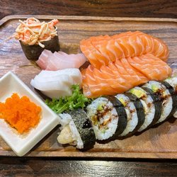 Spicy crab sushi, sashimi (salmon, yellowtail, white tuna), fish roe, & spider roll