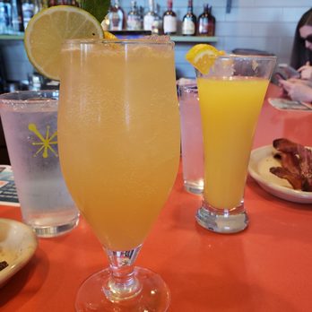 Snooze, an A.M. Eatery - Rummosa and orange mimosa - Breakfast & Brunch Near Me - Boulder, Colorado Snooze, an A.M. Eatery - Rummosa and orange mimosa - Breakfast & Brunch Near Me - Boulder, Colorado