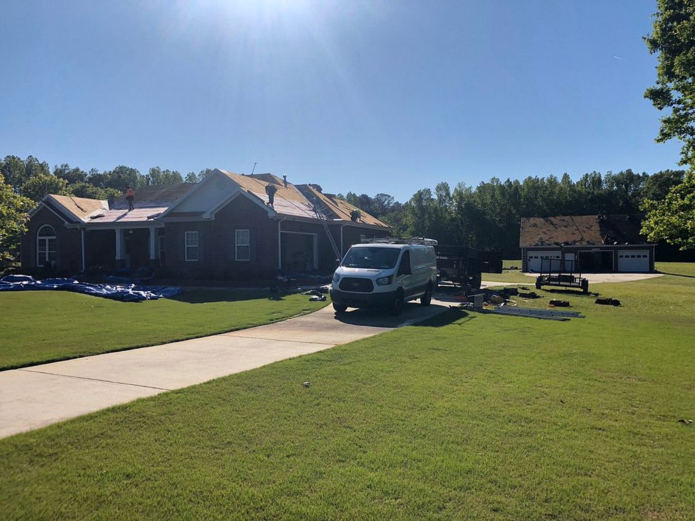 Slide of Shield Roofing and Restoration