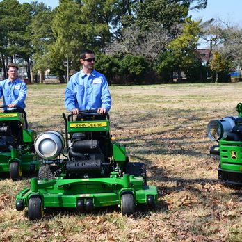 US Lawns - Asheville - two men on lawn mowers - Landscaping Near Me - Mills River, North Carolina US Lawns - Asheville - two men on lawn mowers - Landscaping Near Me - Mills River, North Carolina