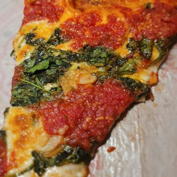 Two Boots Pizza Upper East Side - The Bruckminster. Cheese on the bottom sauce on top. Marinara, spinach, roasted garlic, parmigiano, provolone, mozzarella. Most excellent. - Pizza Near Me - New York, New York Two Boots Pizza Upper East Side - The Bruckminster. Cheese on the bottom sauce on top. Marinara, spinach, roasted garlic, parmigiano, provolone, mozzarella. Most excellent. - Pizza Near Me - New York, New York