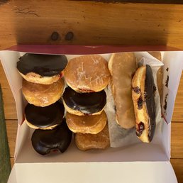 a variety of donuts in a box a variety of donuts in a box