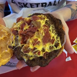 The new mile high burger, not only is it NOT a quarter inch high but I doubt that it's even two pieces of bacon. What a joke!