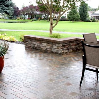 Woody's Custom Landscaping - A small paver patio by the golf course with a cultured stone faced seat wall - Landscaping Near Me - Battle Ground, Washington Woody's Custom Landscaping - A small paver patio by the golf course with a cultured stone faced seat wall - Landscaping Near Me - Battle Ground, Washington