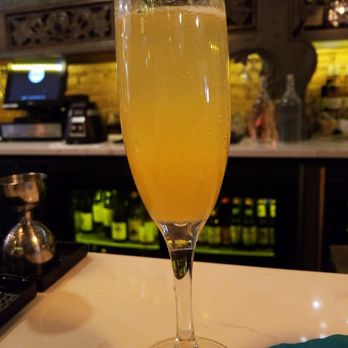 Poor Calvin's - Peach bellini - Asian Fusion Near Me - Atlanta, Georgia Poor Calvin's - Peach bellini - Asian Fusion Near Me - Atlanta, Georgia